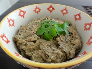 Spicy Black Bean Hummus with green garnish