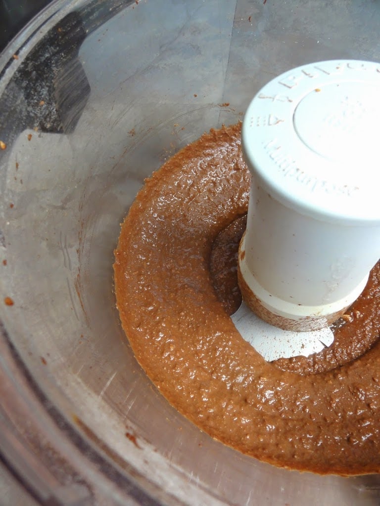 ingredients of almond pulp freezer fudge in a food processor