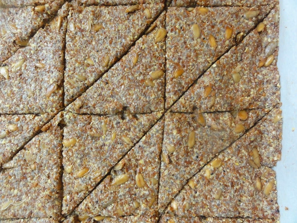 portioned Multi Seed Crackers batter on baking sheet