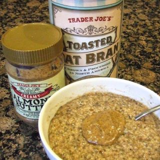 growing oat bran bowl next to trader joe's oat bran and a jar of almond butter