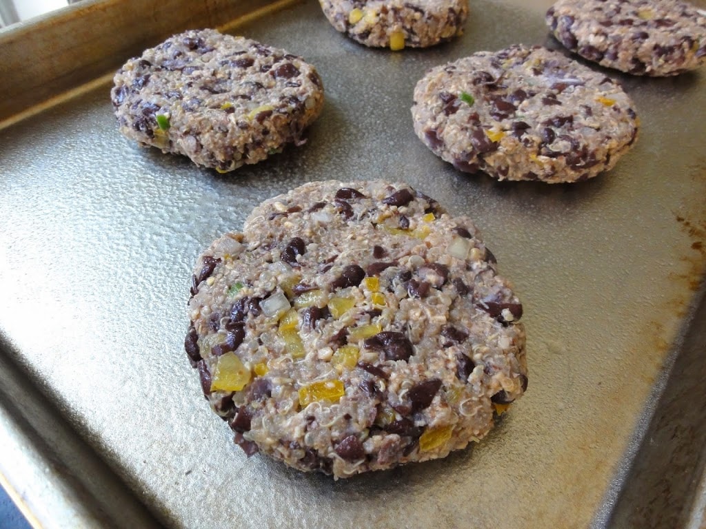Black Bean and Quinoa Veggie Burger patties on a baking tray