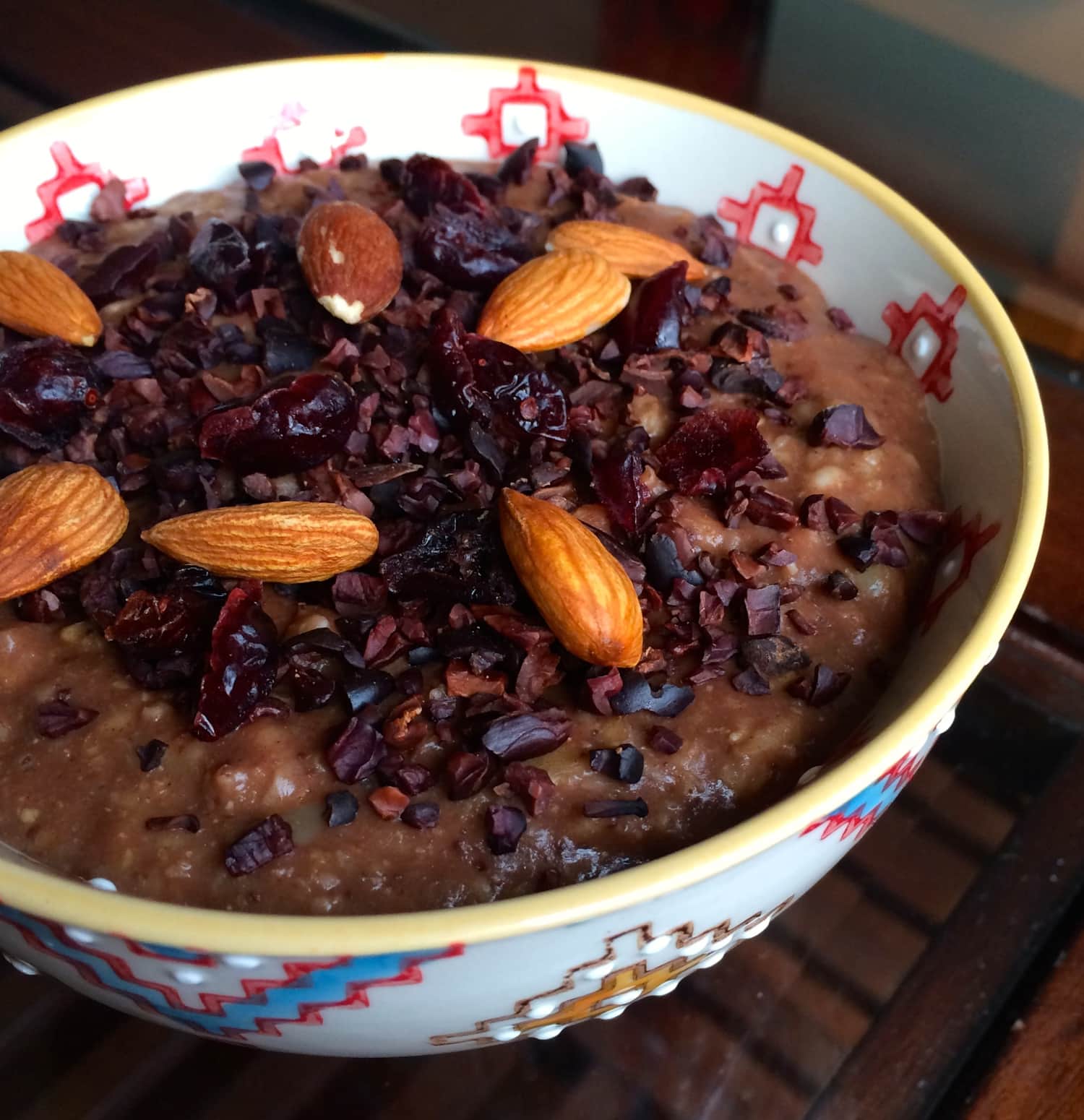 Chocolate Oatmeal topped with Cacao Nibs, Craisins and Almonds