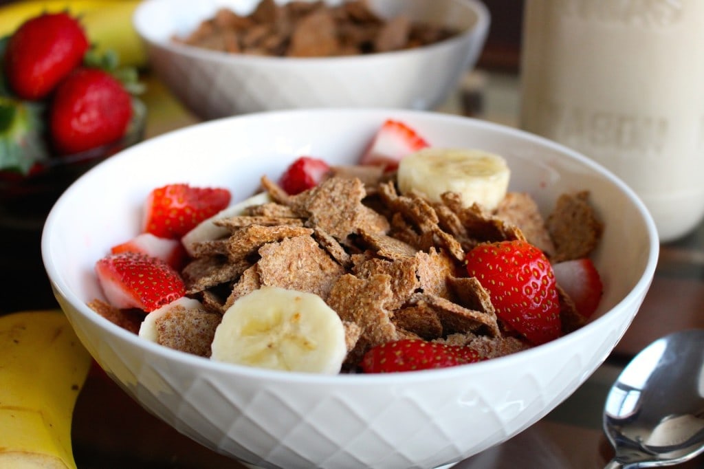 flaky homemade bran cereal in a bowl with fruit