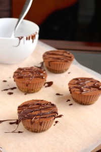 Mini Vegan Chocolate Cheesecakes drizzled with chocolate