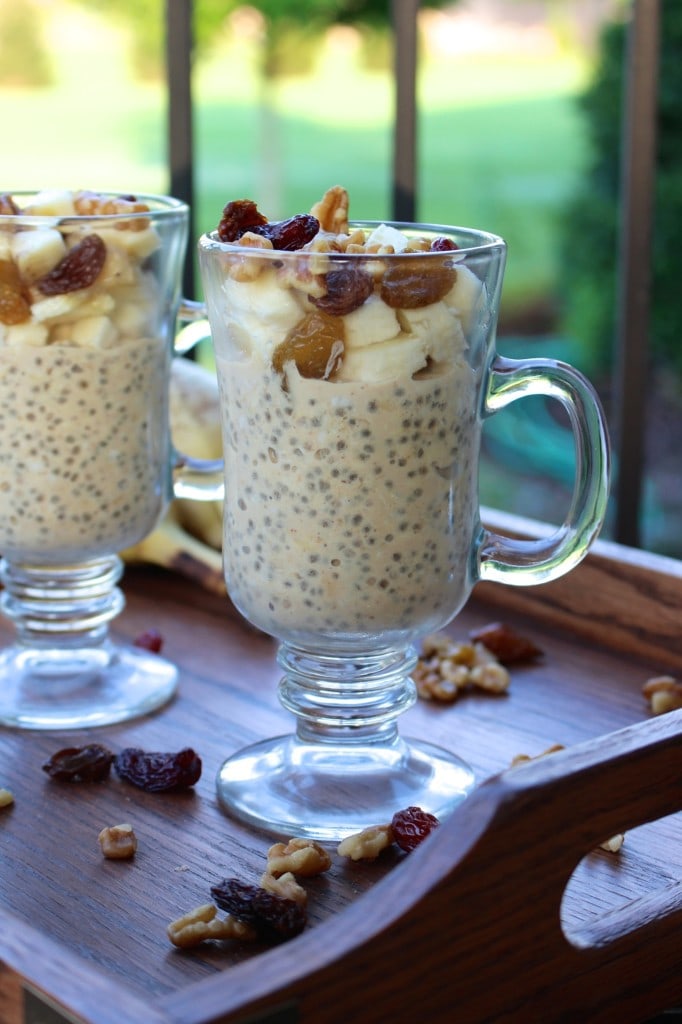 Low-Fat Vegan Peanut Butter Overnight Oats in a glass cup with toppings