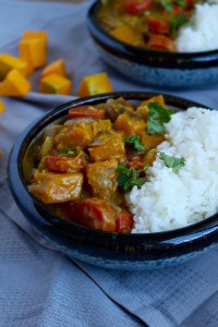 Pumpkin and Carrot Curry garnished with cilantro