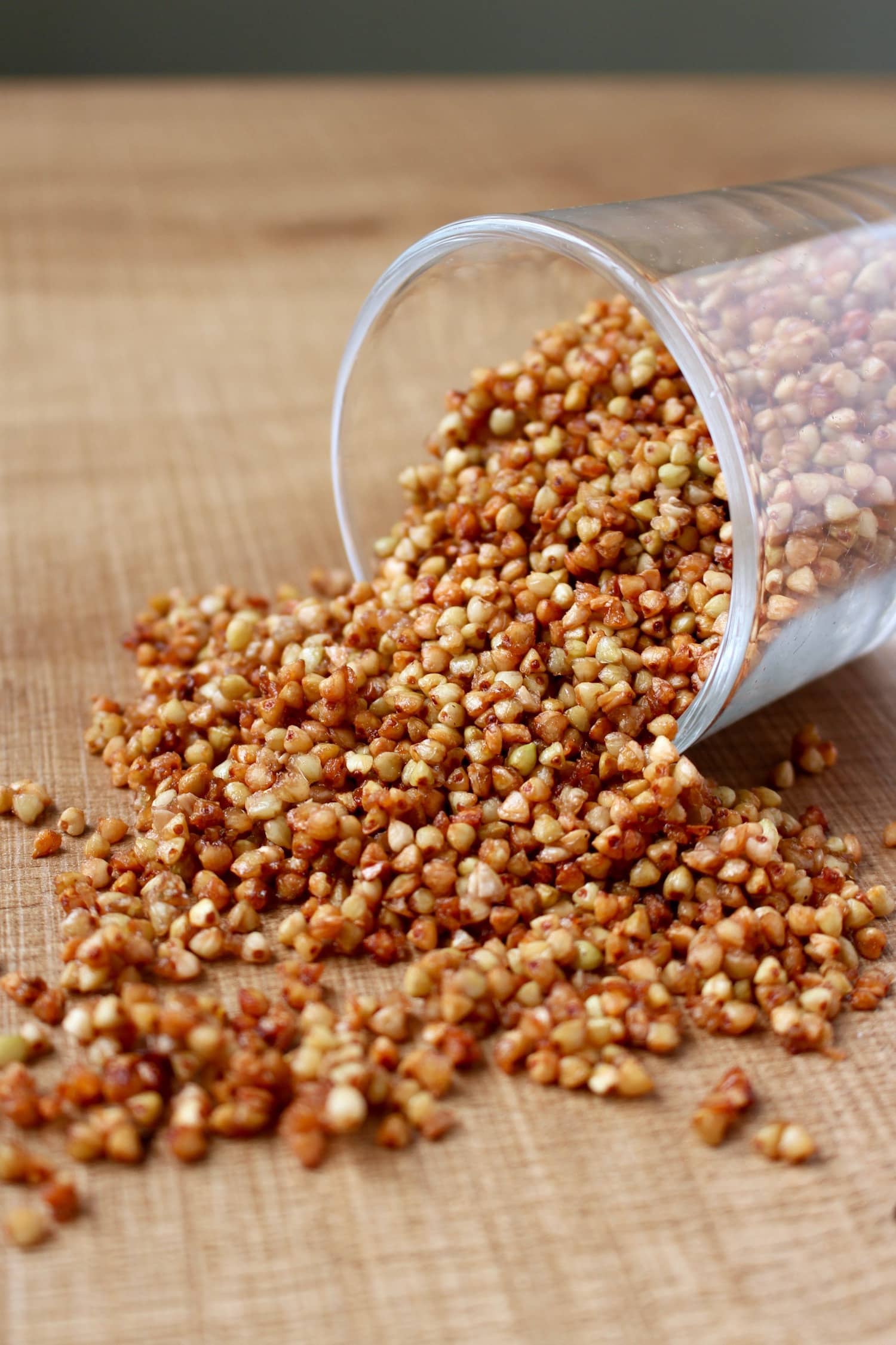 Caramelized Buckwheat Groats pouring out of jar