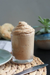 Dairy-Free Cinnamon Maple Cream Cheese piled high in a glass jar