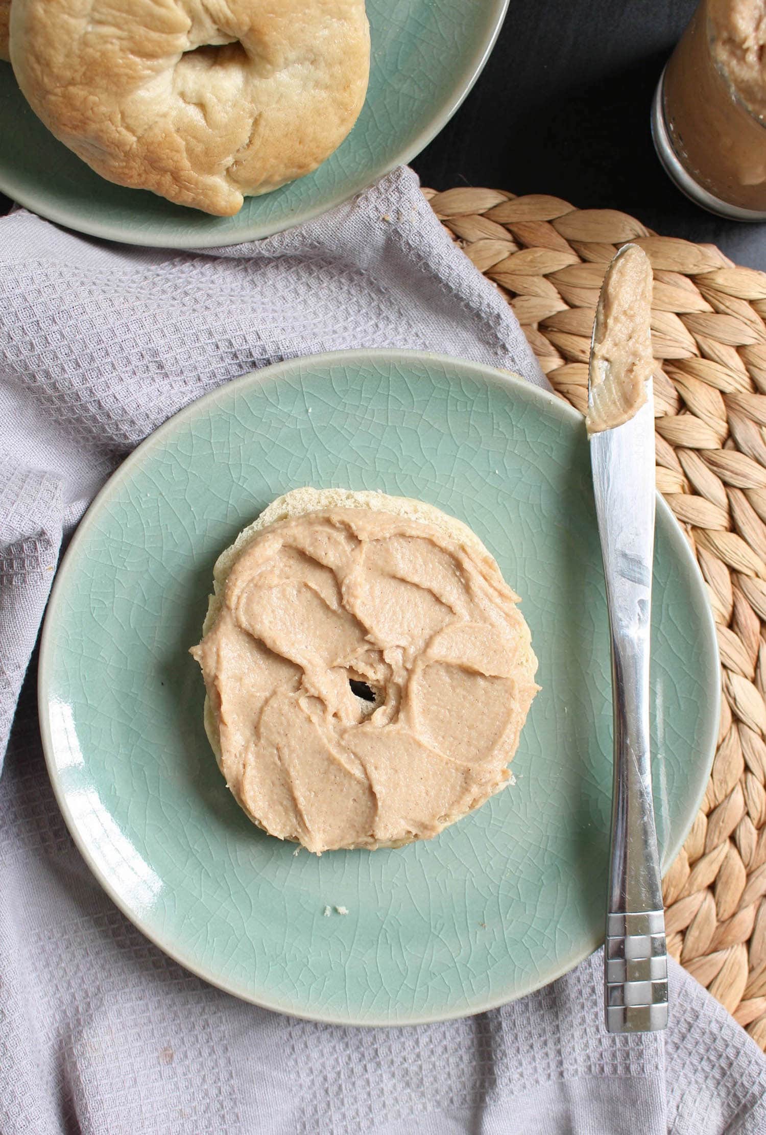 Dairy-Free Cinnamon Maple Cream Cheese smeared on a bagel