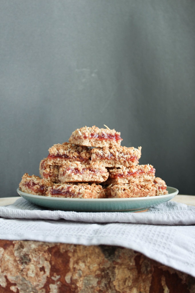 Vegan Strawberry Jam Oatmeal Bars stacked on a plate