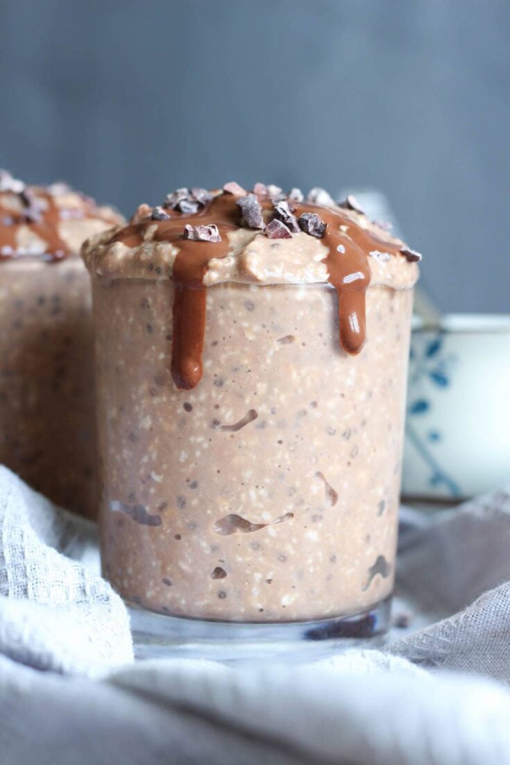 Brownie Batter Vegan Protein Overnight Oats glasses next to each other