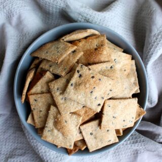 Homemade Whole Grain Sesame Crackers in a bowl