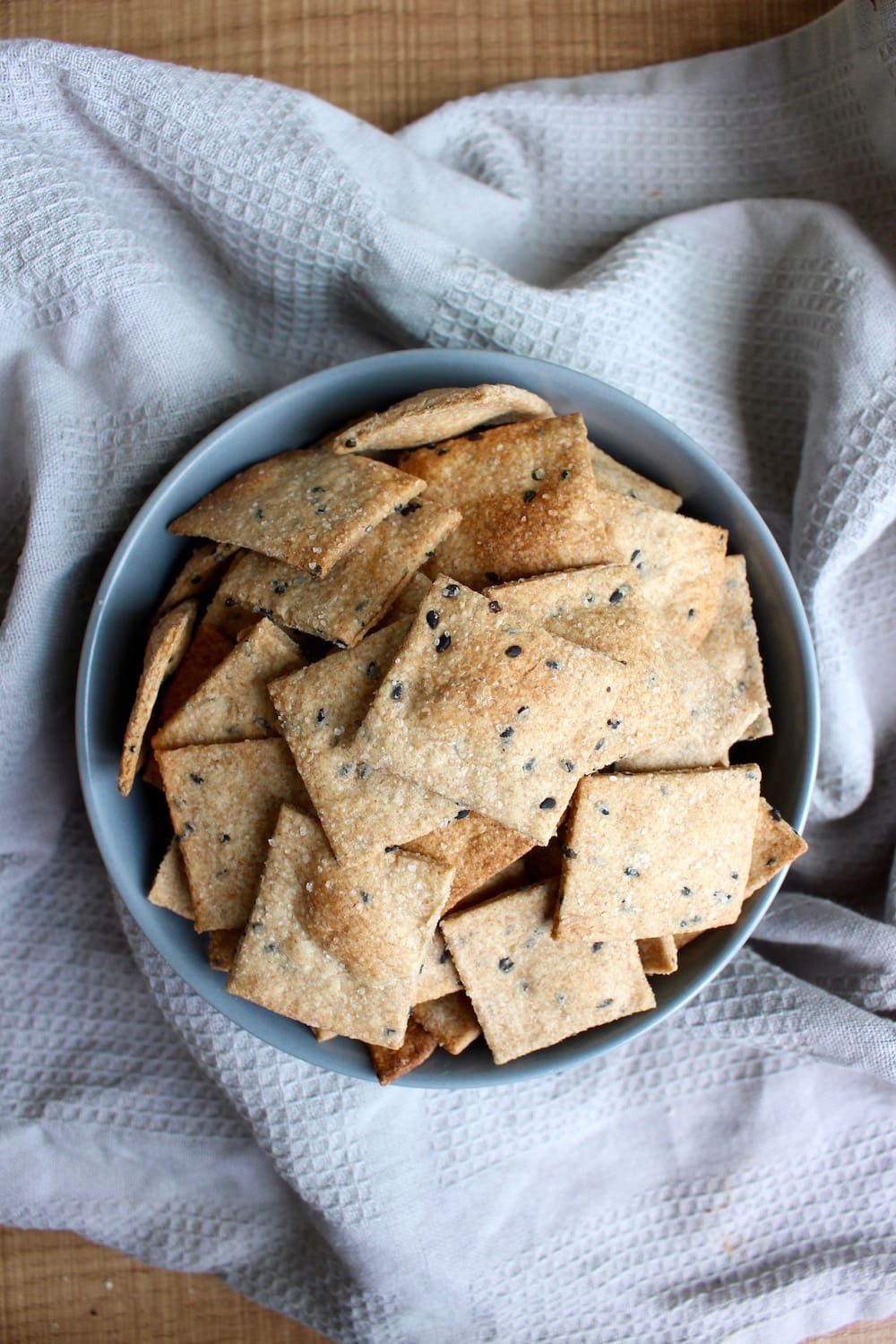 Homemade Whole Grain Sesame Crackers in a bowl