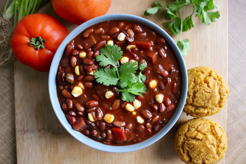 a big bowl of vegan black bean chili that was made in an Instant pot