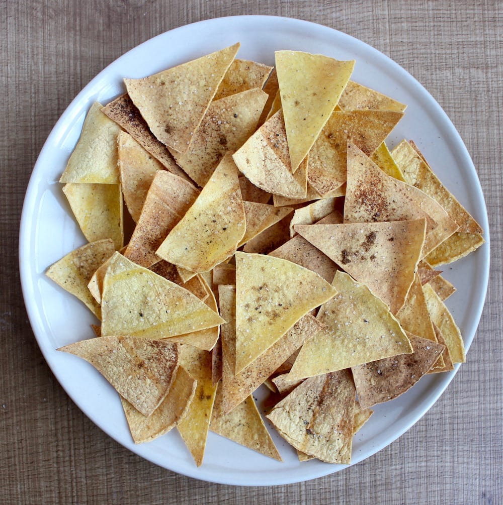 a plate of homemade, oil-free baked tortilla chips