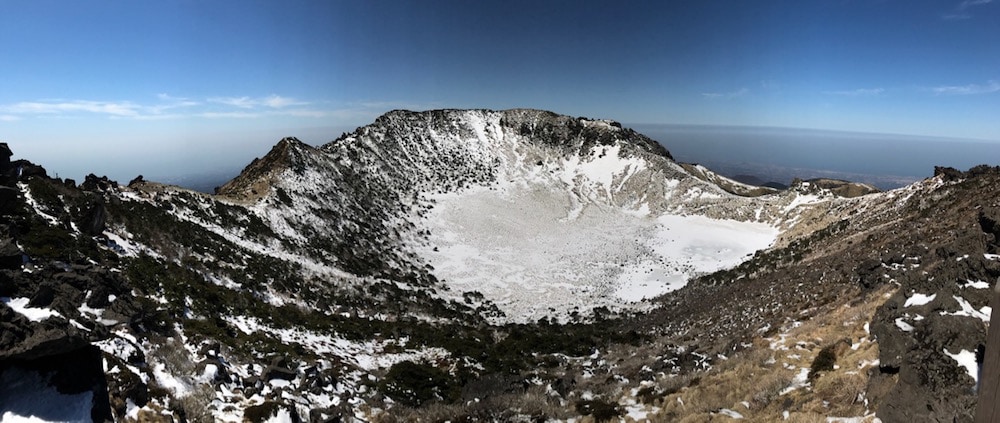 Volcano in Jeju Island partially covered of snow