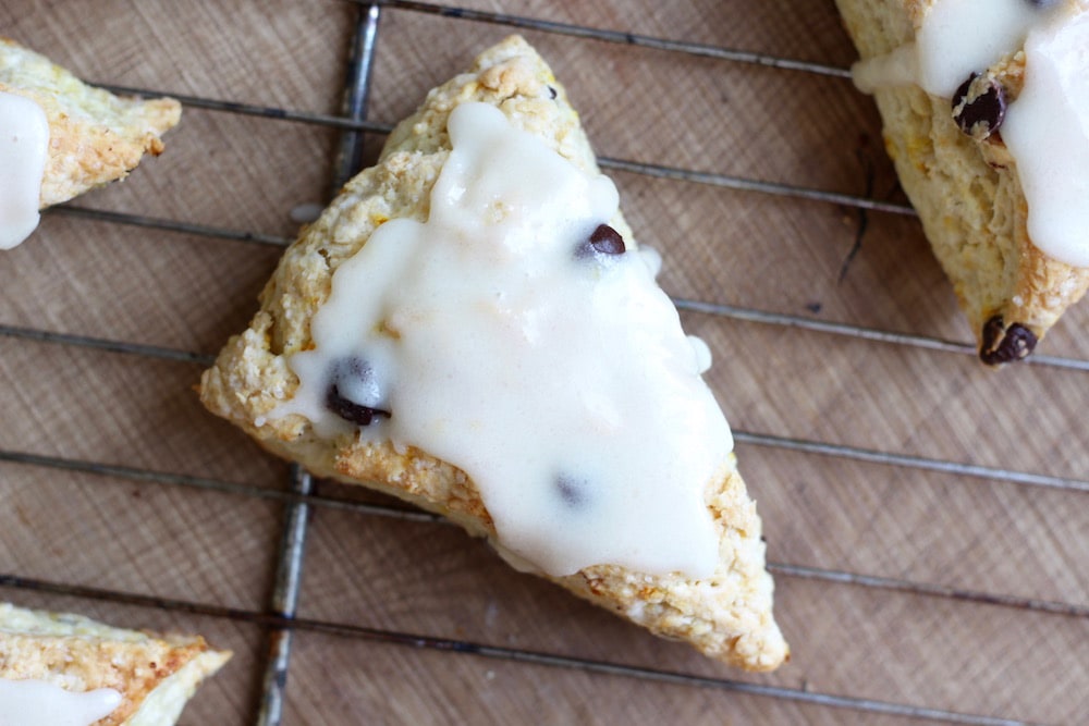 Vegan Orange Chocolate Chip Scones with glaze topping