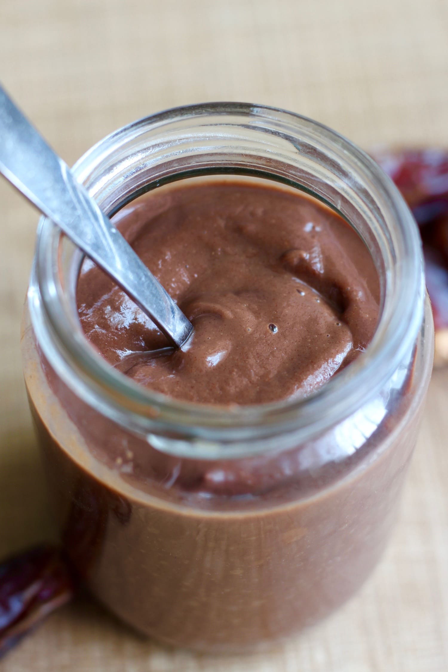 Date sweetened chocolate sauce in a jar