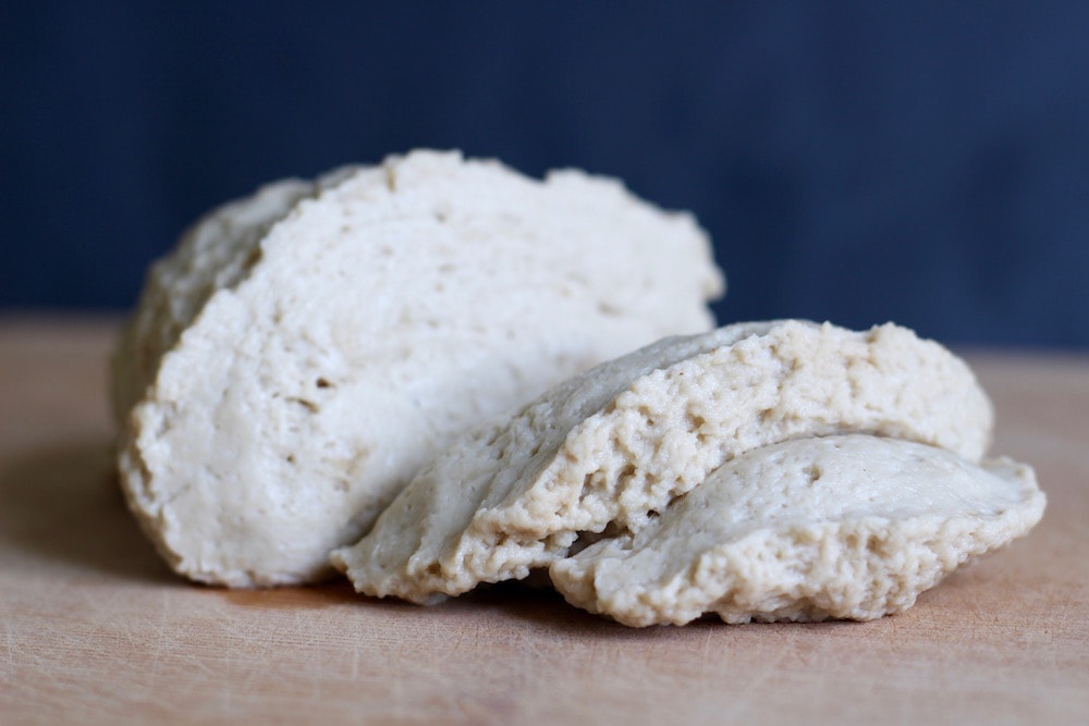 lump of seitan dough sliced into three sections