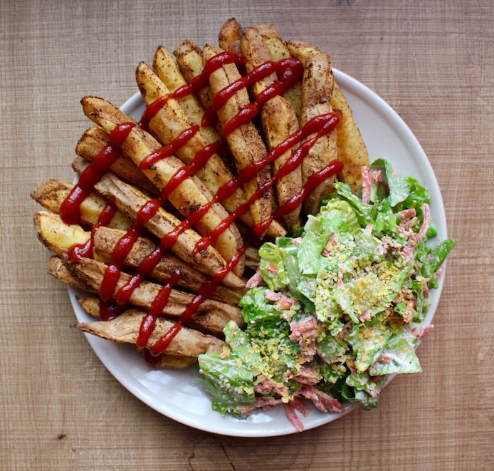 Baked fries and Caesar Salad