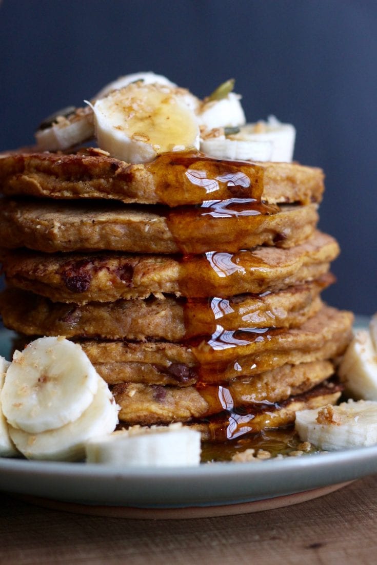 Whole Wheat Vegan Pumpkin Pancakes with maple syrup