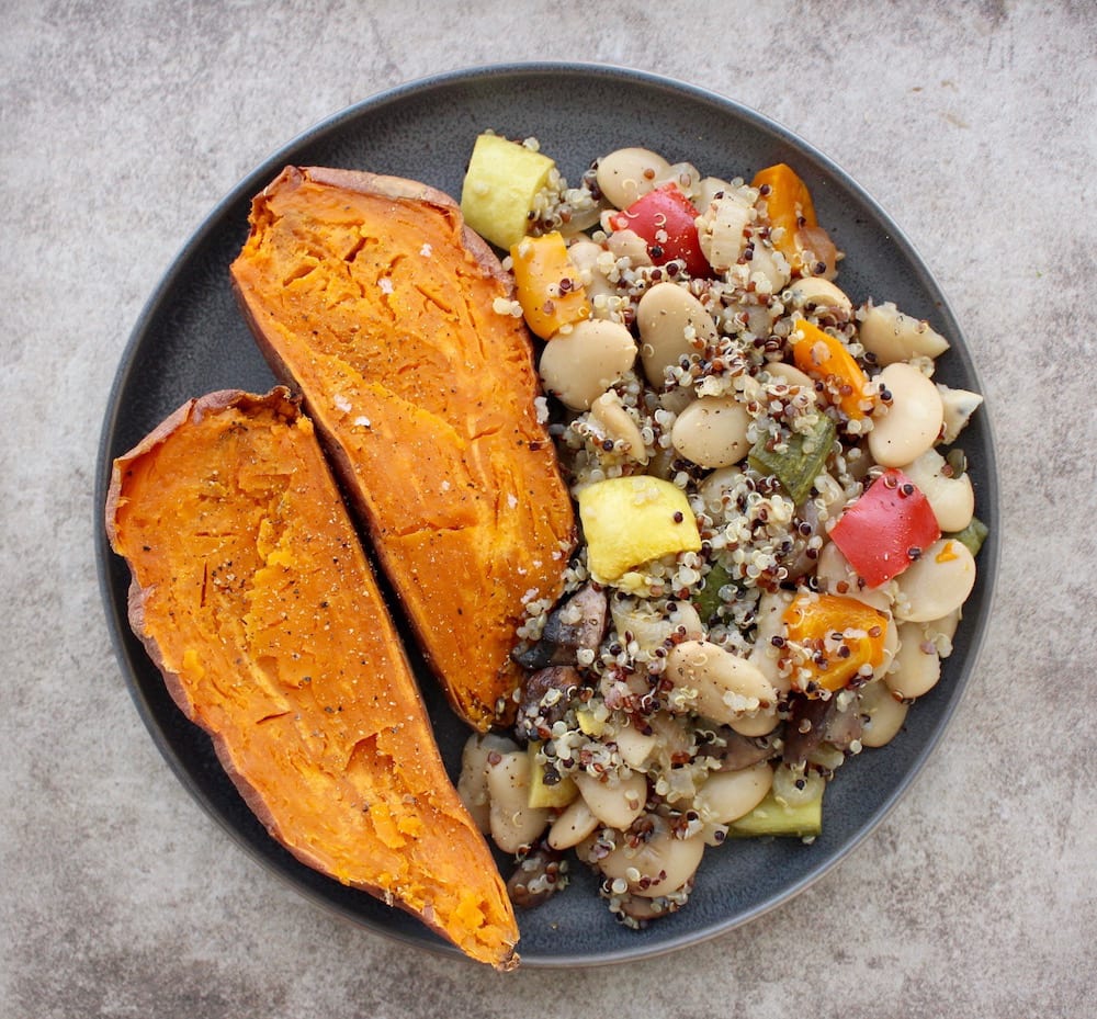 Baked sweet potato with a side butter bean, quinoa and veggie "salad"