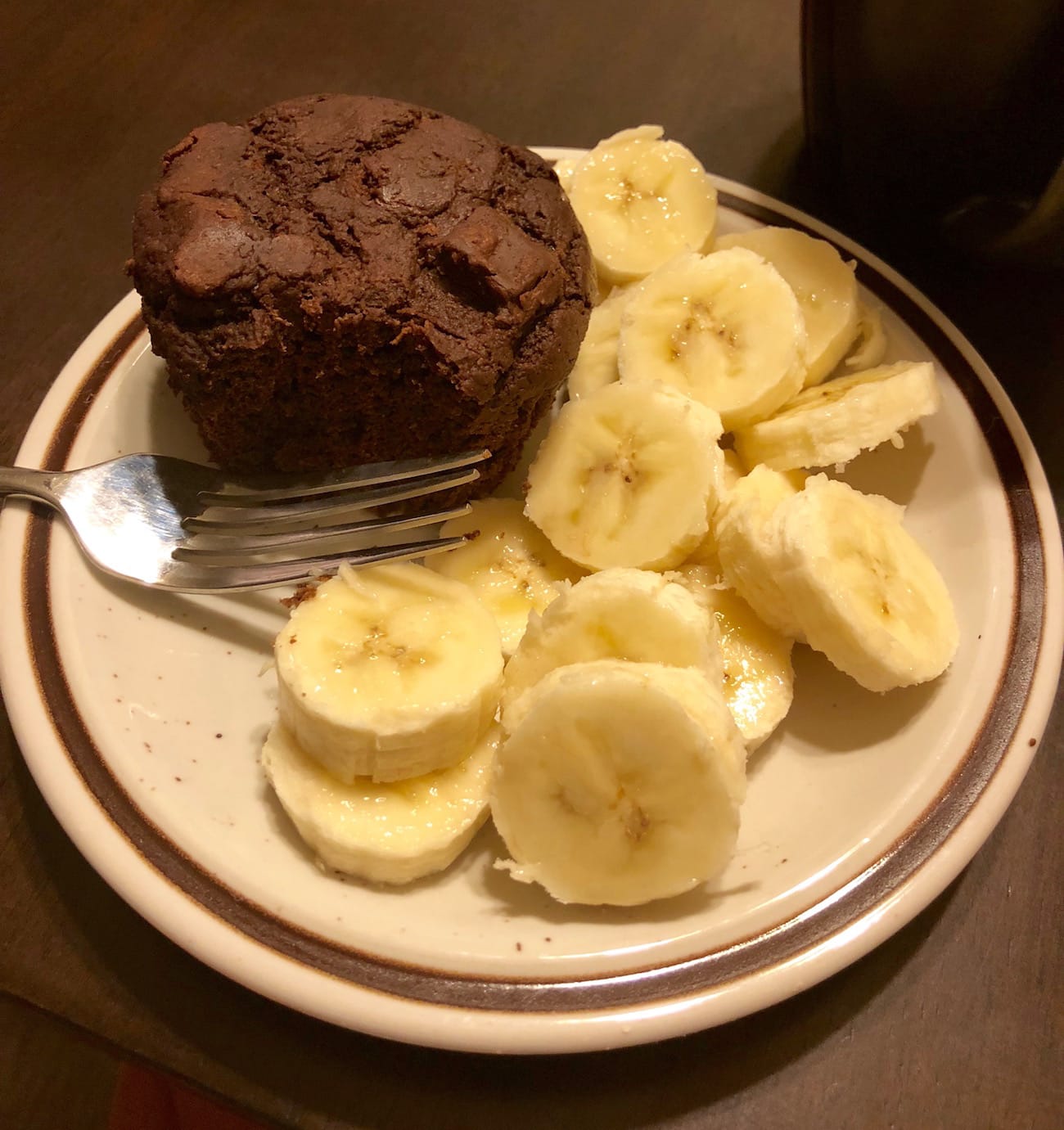 Chocolate Yogurt Muffin with a sliced banana