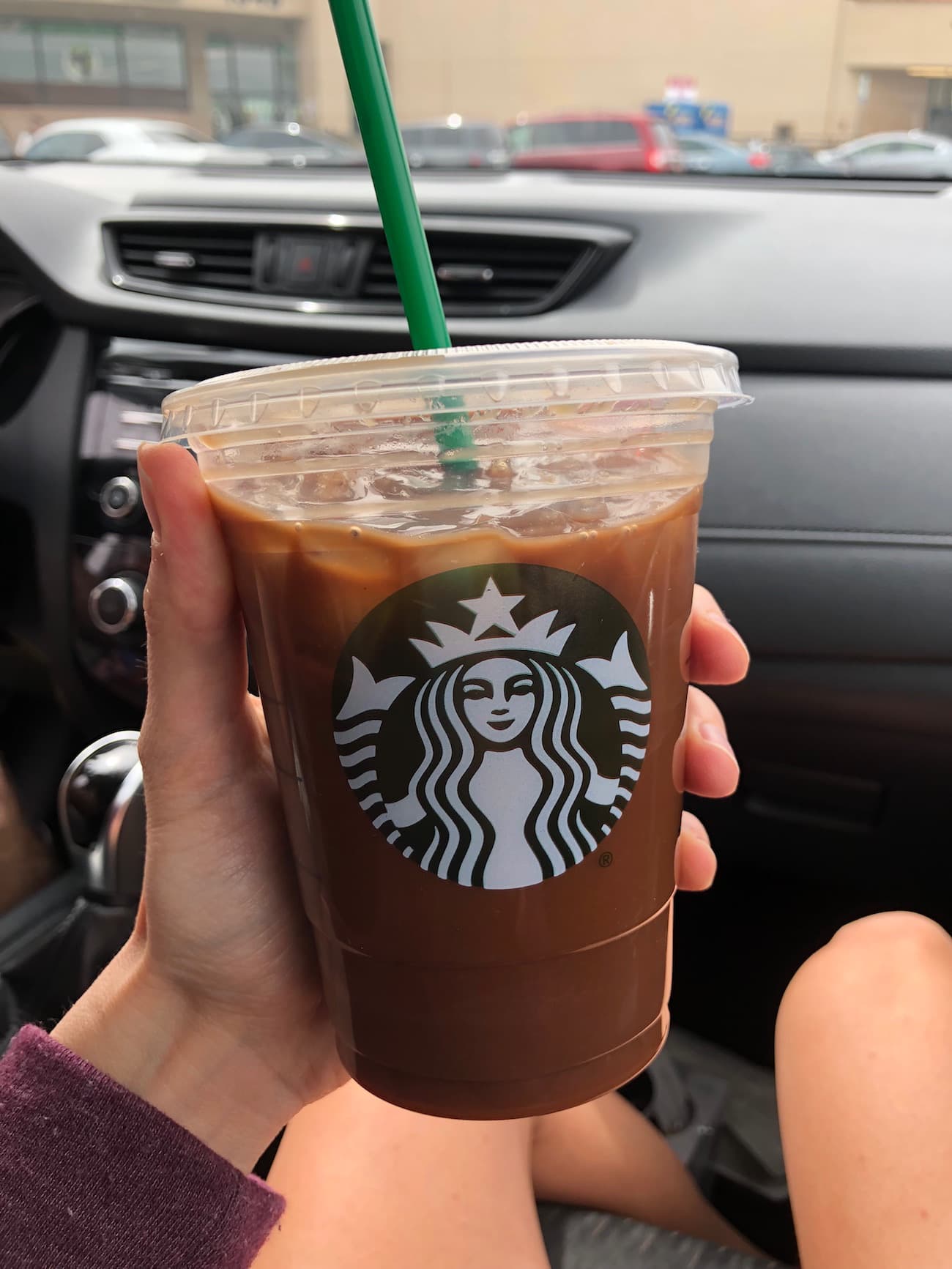 Iced decaf americano with one pump of mocha with a splash of almond milk