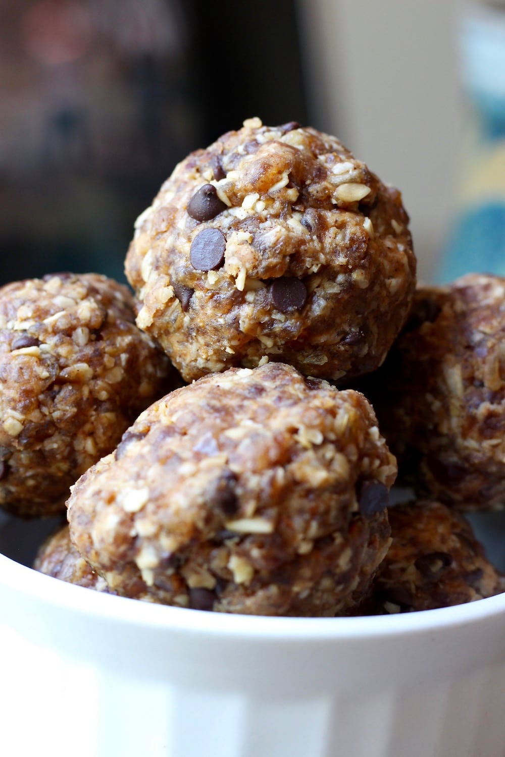 stacked Cinnamon Oatmeal Cookie Dough Balls in a bowl