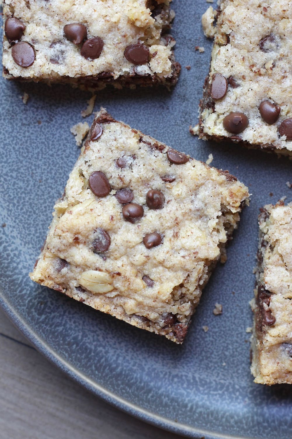 Gluten Free Vegan Chocolate Chip Oatmeal Blondies on a plate