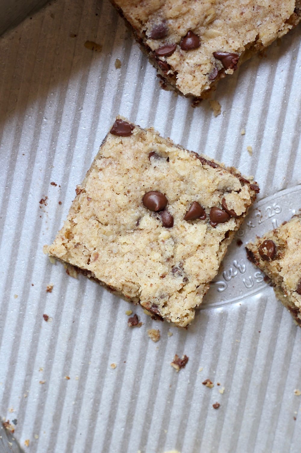 Gluten Free Vegan Chocolate Chip Oatmeal Blondies on baking pan