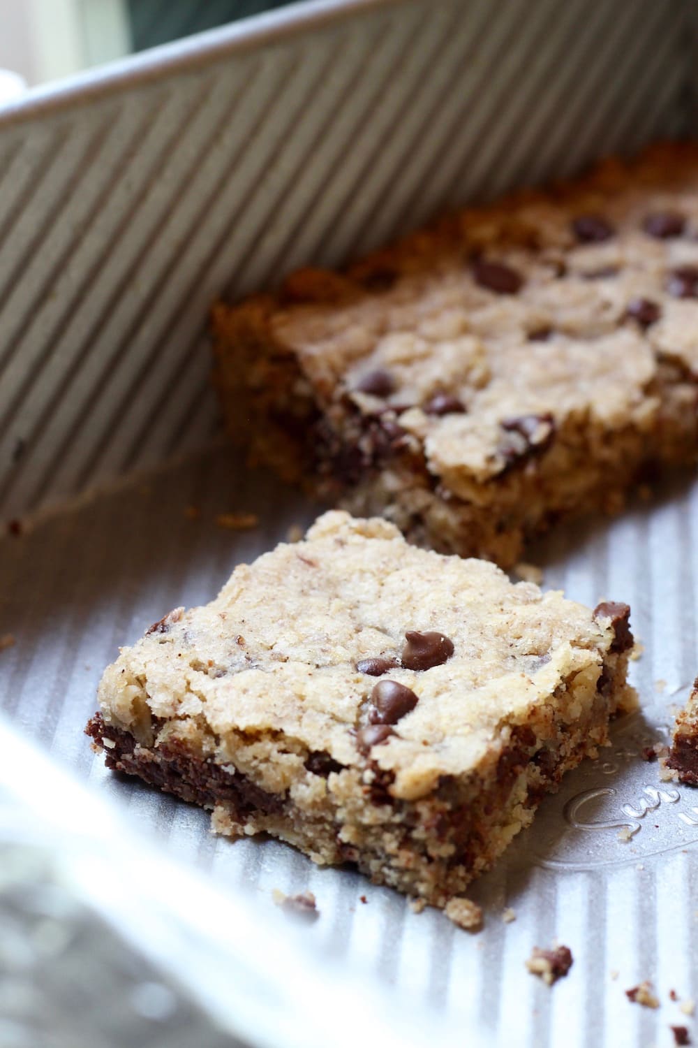 Gluten Free Vegan Chocolate Chip Oatmeal Blondies on baking pan