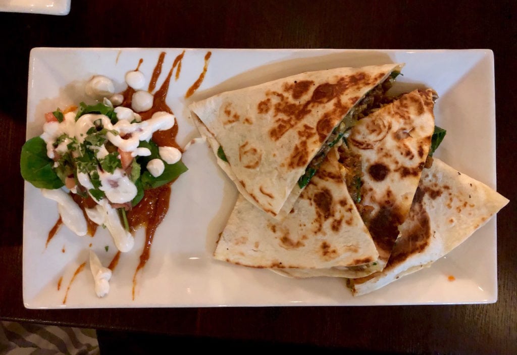 flavorful quesadilla with faux meat and yummy cream sauce