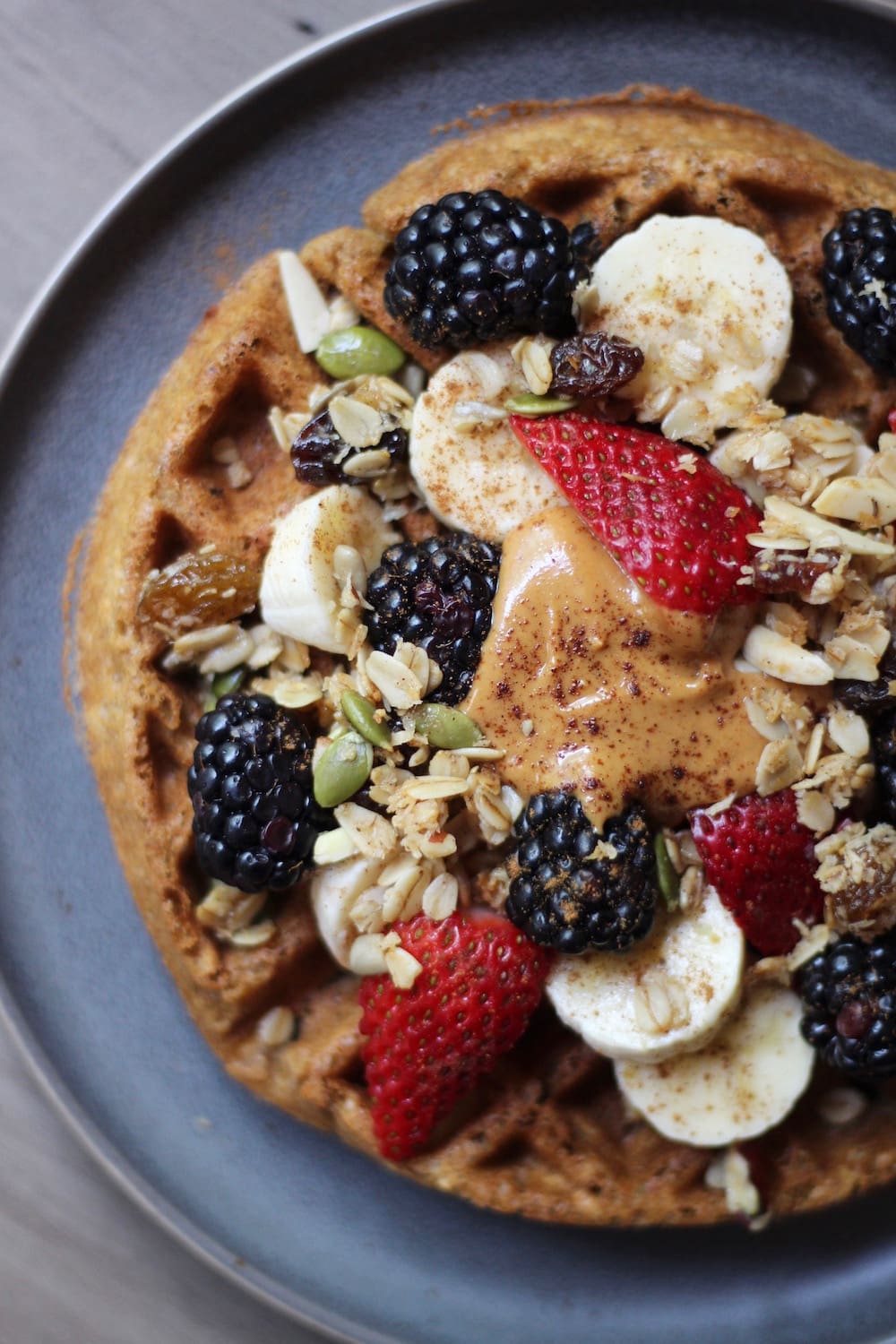 Vegan Whole Grain Waffles with berries and peanut butter