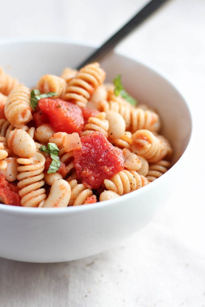 a bowl full of vegan Italian White Bean Pasta Salad