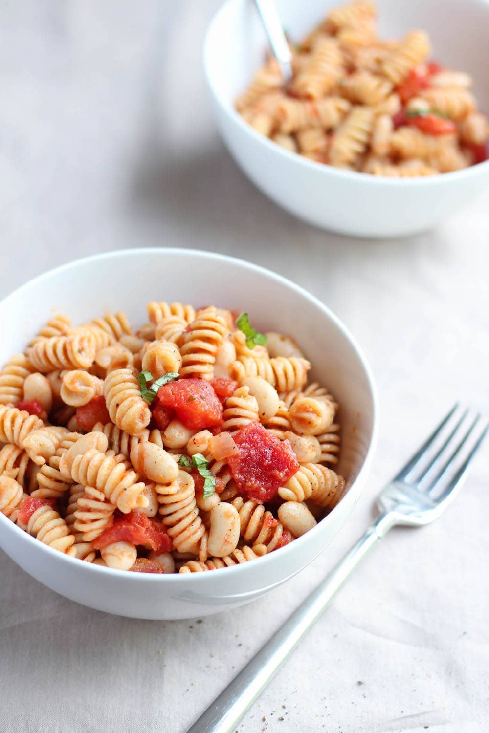 4 Ingredient Italian Pasta Salad with white beans divided between two bowls