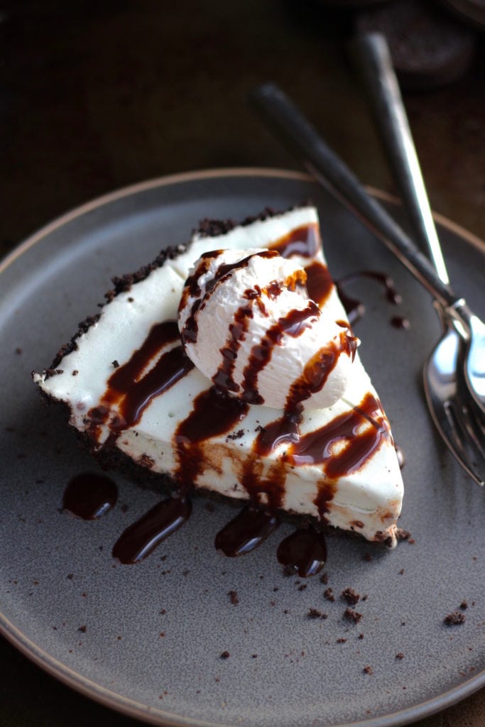 ice cream cake on a plate with spoon