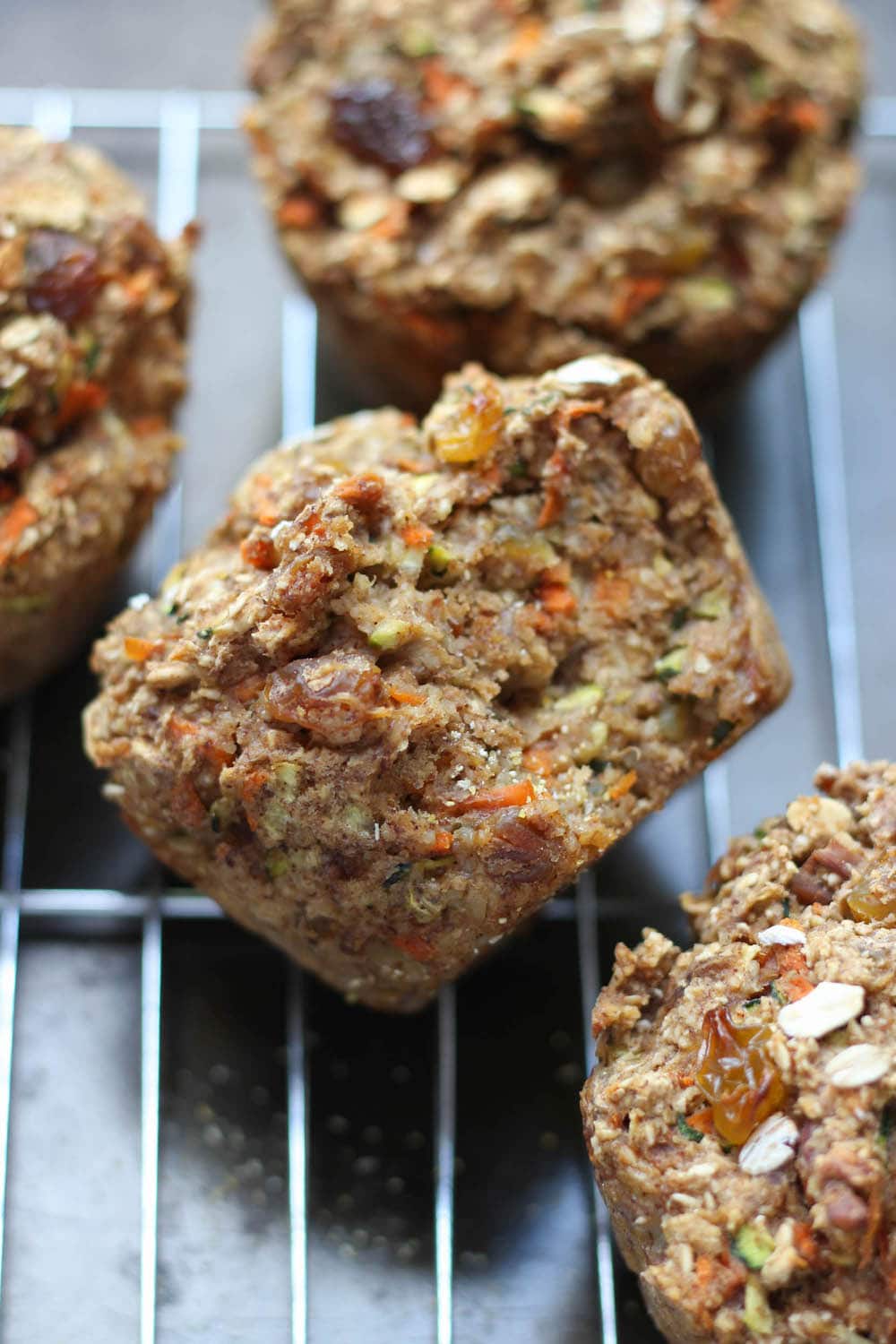 Zucchini Carrot Oatmeal Breakfast Muffins cooling on a wire rack