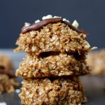 Almond Butter Coconut No Bake Cookies stacked on each other