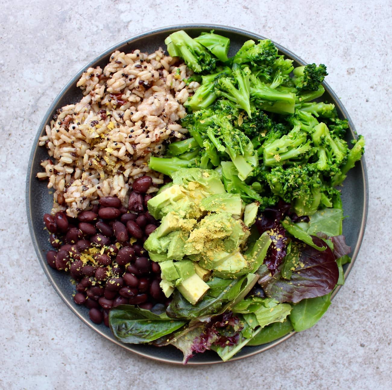 Microwaveable rice with beans, broccoli and avocado