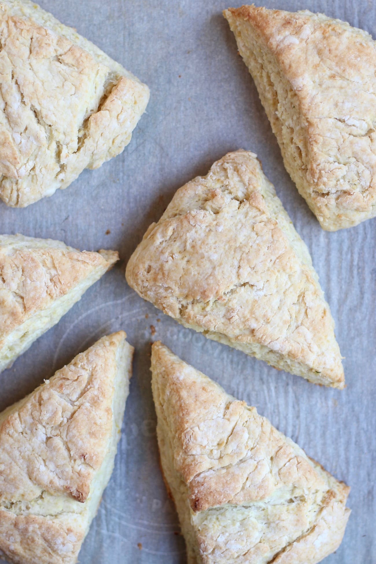 golden brown scones on a baking sheet