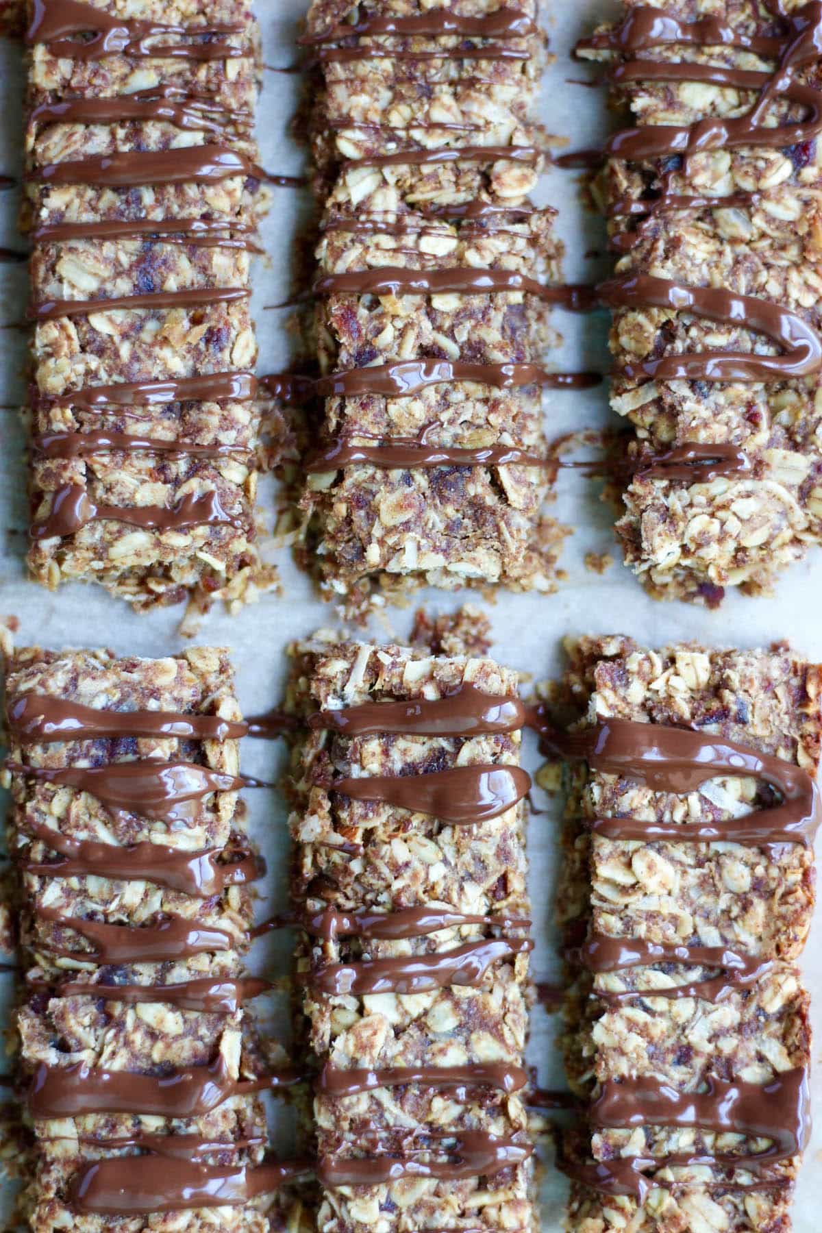 Chewy Almond Butter Date Granola Bars drizzle with chocolate