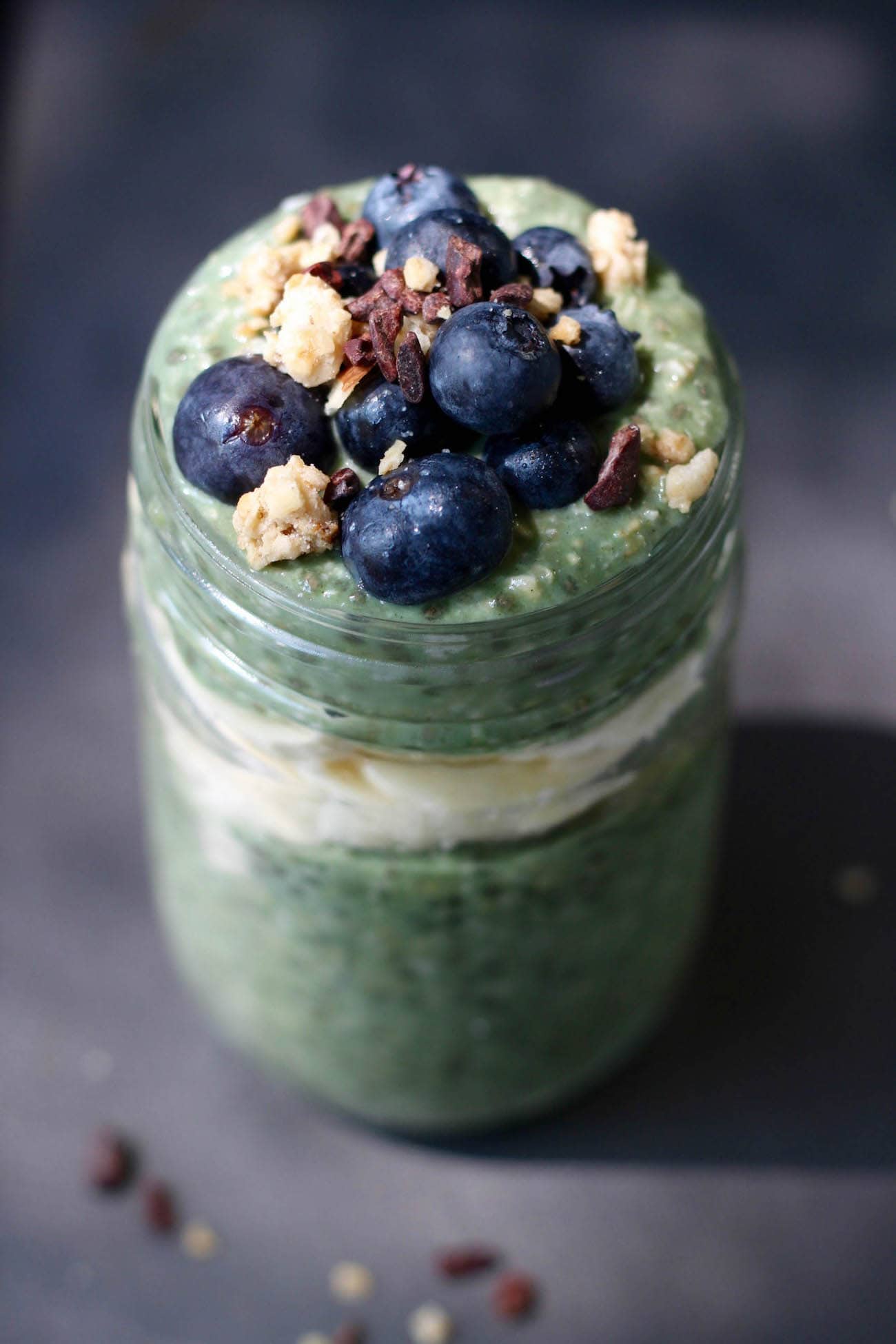 Green Superfood Overnight Oats topped with blueberries and granola