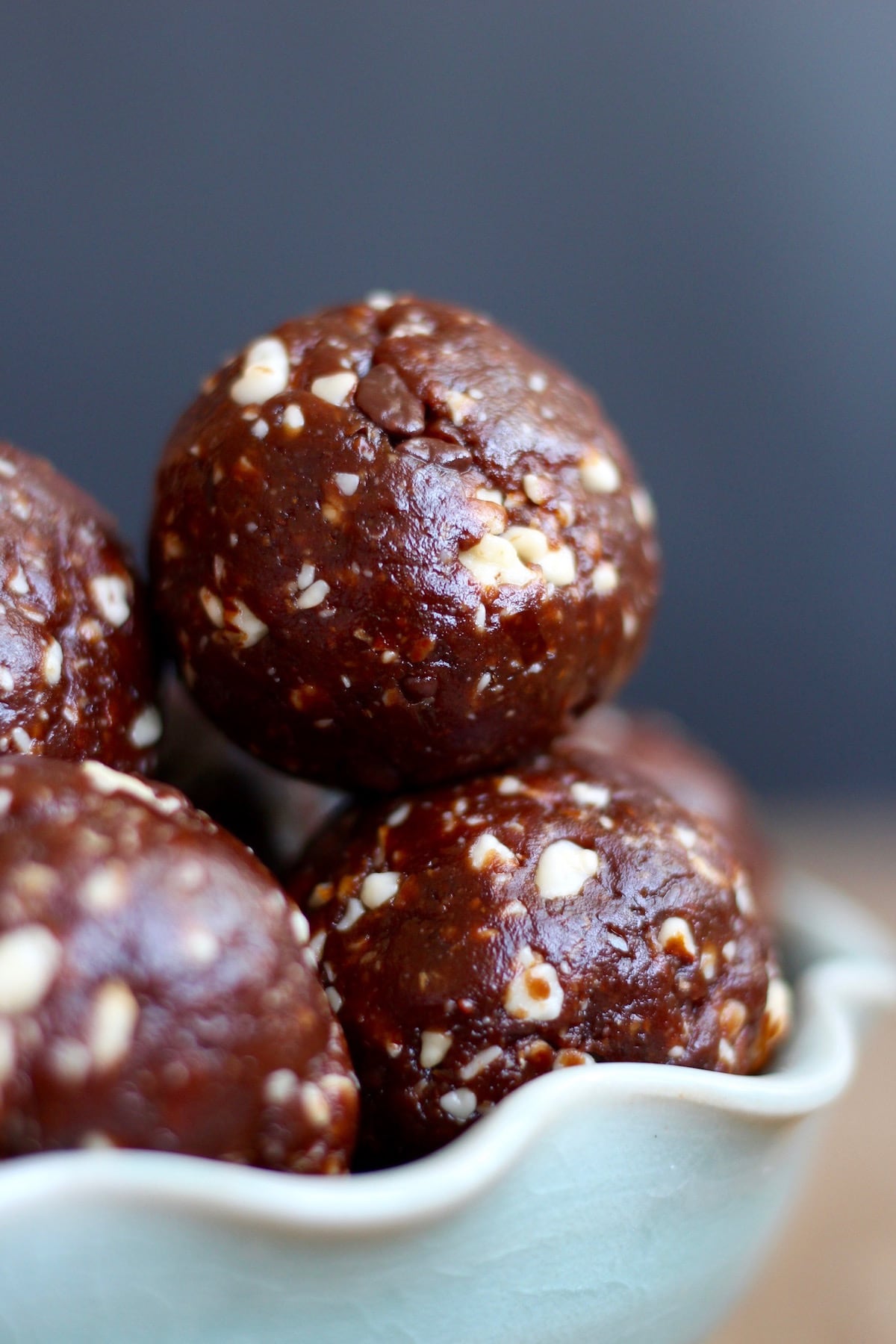 Chocolate Orange Bliss Balls piled high in a bowl