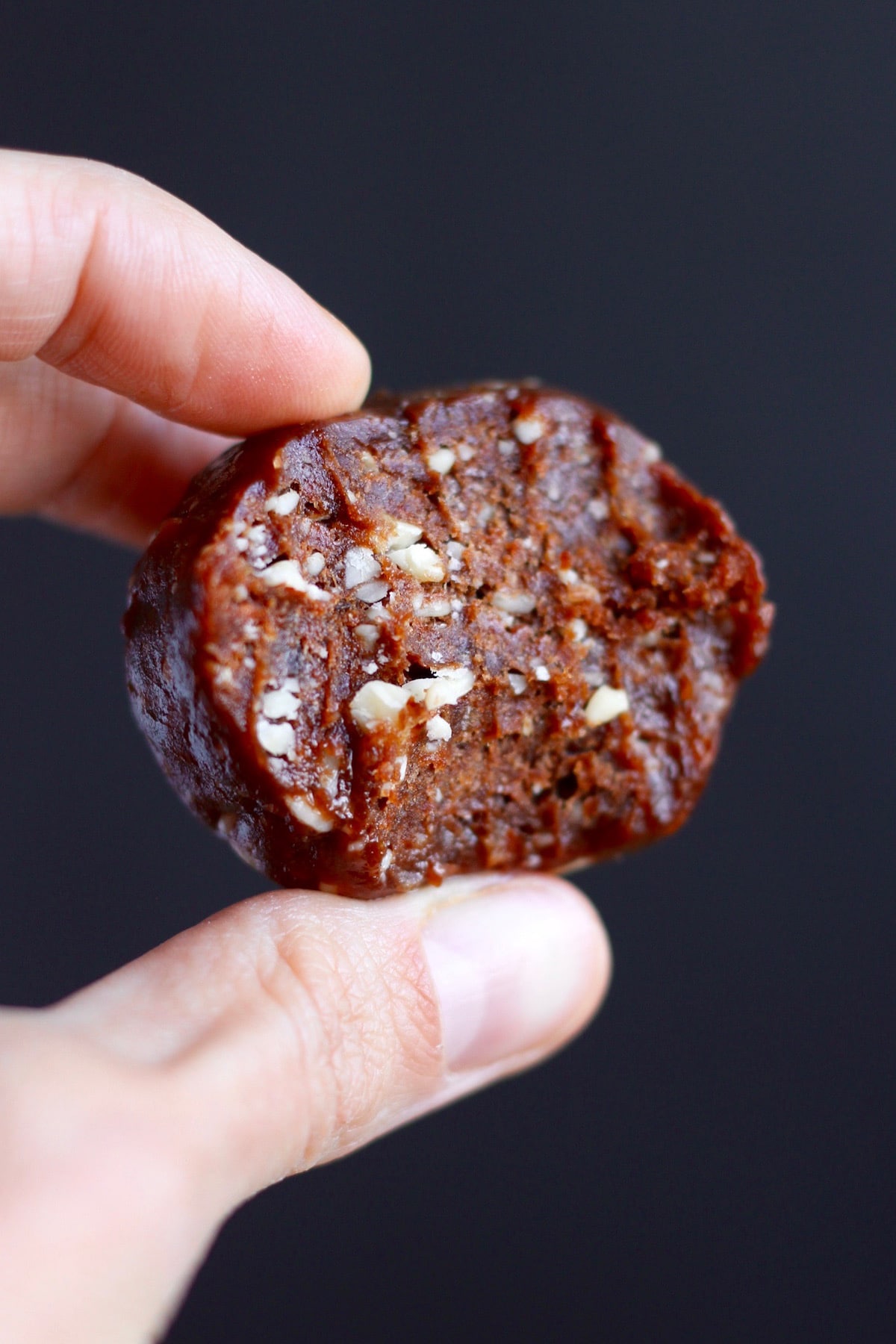 a bite taken out of a Chocolate Orange Bliss Ball