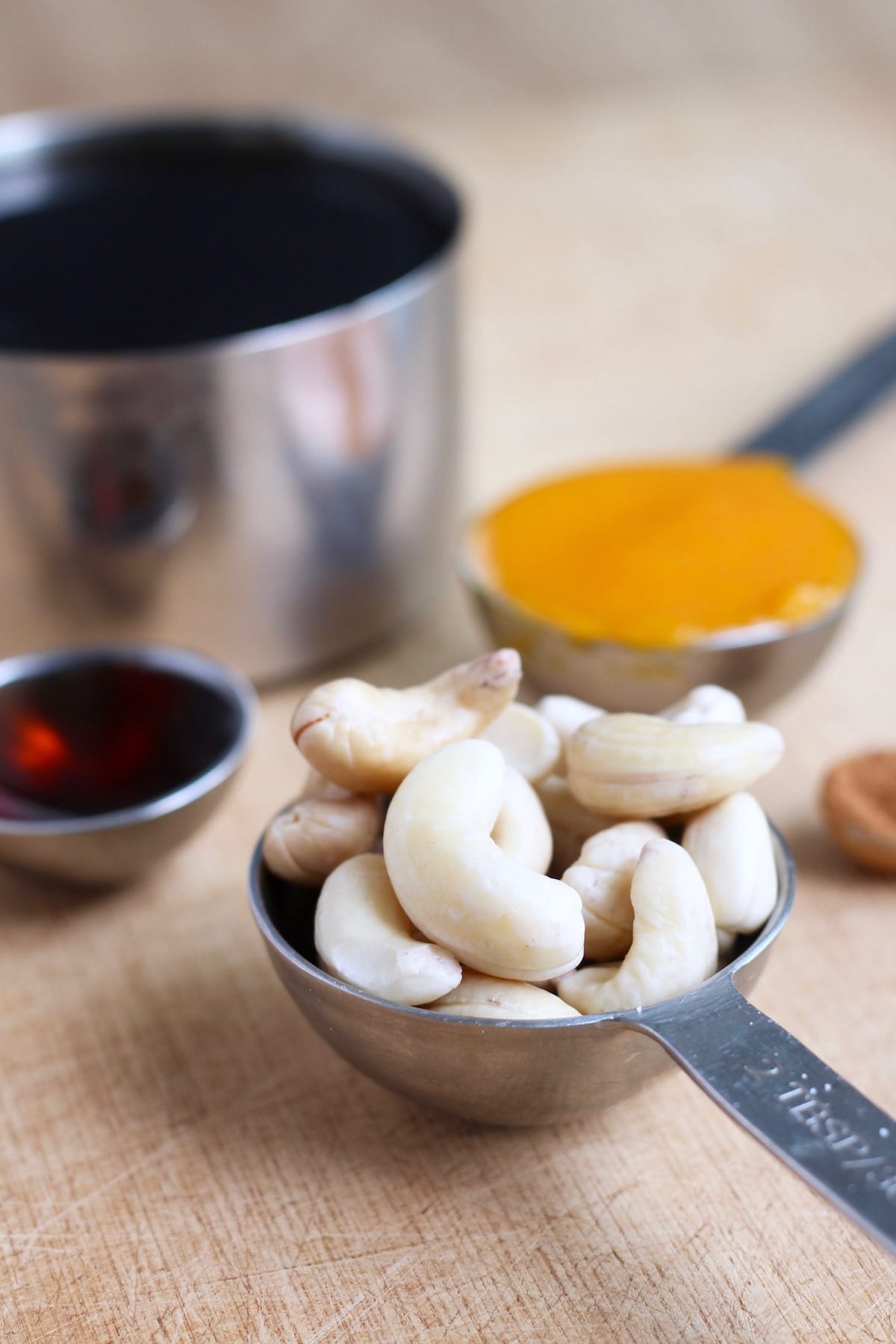 cashews, pumpkin puree, maple syrup and coffee prepped for a homemade pumpkin spice latte
