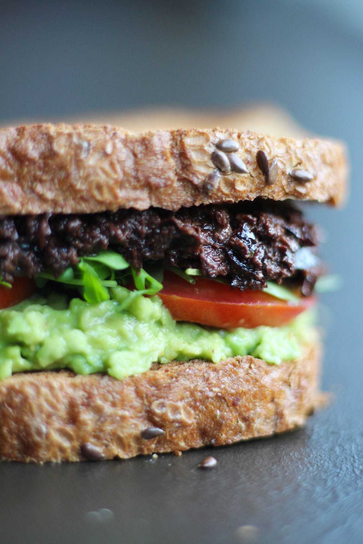 vegan tapenade and avocado sandwich