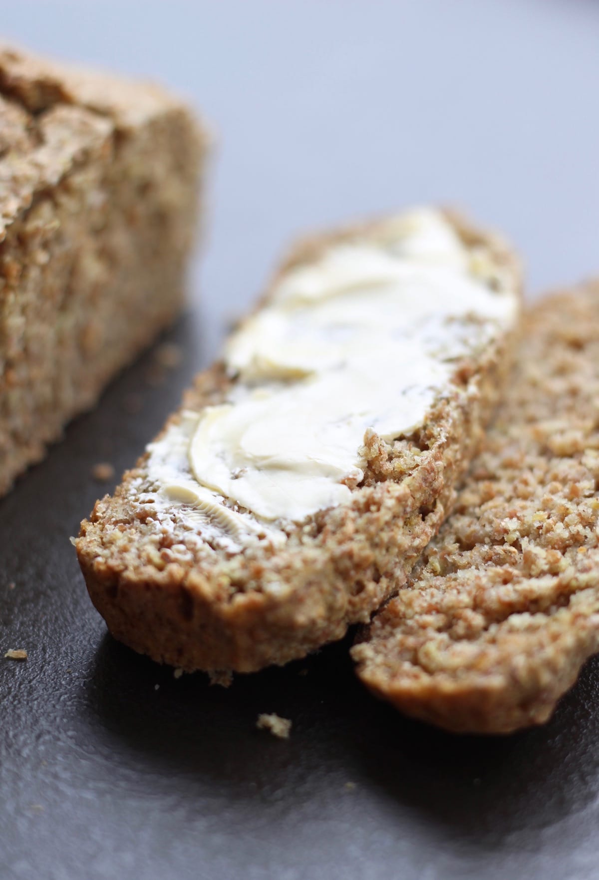 vegan butter slathered onto dairy free Irish brown bread