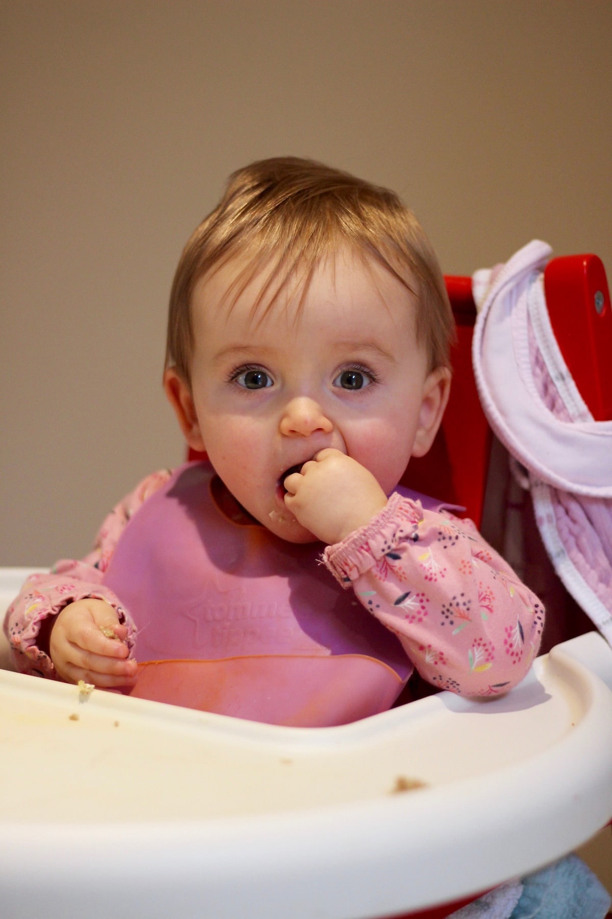 baby girl eating Irish brown bread