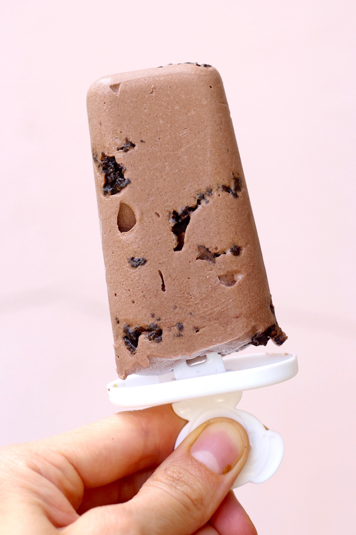 a creamy chocolate popsicle with brownie bits